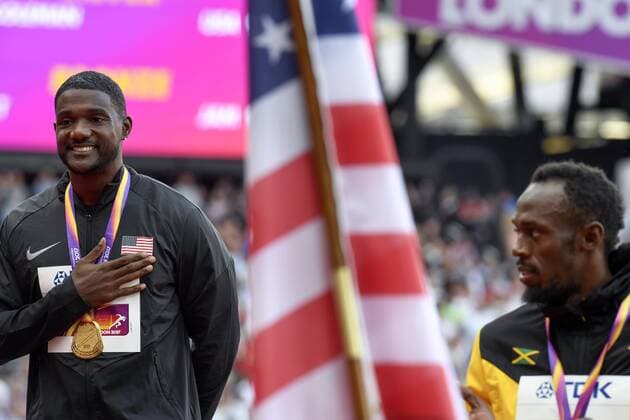 Bilder des Tages - SPORT 170806 USAs Justin Gatlin och Jamaicas Usain Bolt vid prisutdelningen för 100-meter under dag tre av friidrotts-VM den 6 augusti 2017 i London.  Copyright: JONxOLAVxNESVOLD BB170806JE047
