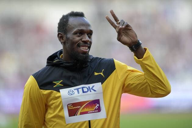 170806 Jamaicas Usain Bolt gestikulerar vid prisutdelningen för 100 meter under dag tre av friidrotts-VM den 6 augusti 2017 i London.  Copyright: JOELxMARKLUND BB170806JM103