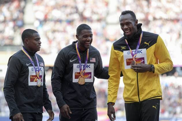 170806 USAs Christian Coleman, USAs Justin Gatlin och Jamaicas Usain Bolt vid prisutdelningen för 100 meter under dag tre av friidrotts-VM den 6 augusti 2017 i London.  Copyright: JOELxMARKLUND BB170806JM108
