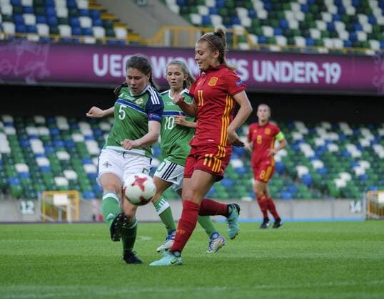 August 8th 2017, Windsor Park, Belfast, Northern Ireland; Womens Under 19s European Championship EM Europameisterschaft Finals; Northern Ireland versus Spain; Teresa Burns of Northern Ireland clears the ball under pressure from Carmen Menayo of Spain xNigelxCookex  ActionPlus11913083