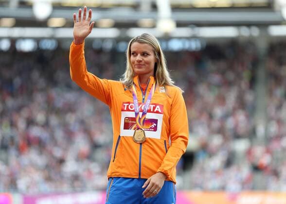 August 12th 2017, London Stadium, East London, England; IAAF World Championships, Day 9; Dafne Scippers of Netherlands waves to the crowd with the Gold medal for Women s 200 metres during the medal ceremony xJohnxPatrickxFletcherx  ActionPlus11915492