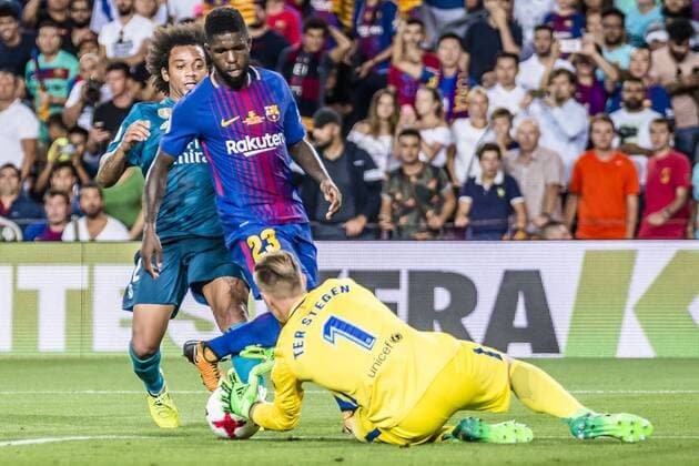 August 13, 2017 - Barcelona, Catalonia, Spain - Real Madrid defender MARCELO competes with FC Barcelona Barca defender UMTITI and FC Barcelona goalkeeper TER STEGEN for the ball during the Spanish Super Cup Final 1st leg between FC Barcelona and Real Madrid at the Camp Nou stadium in Barcelona FC Barcelona 1:3 Real Madrid - Spanish Super Cup 2017 - ZUMAo105 20170813_zap_o105_048 Copyright: xMatthiasxOesterlex