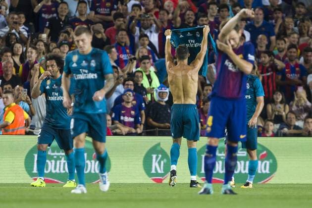 August 13, 2017 - Barcelona, Catalonia - Cristiano Ronaldo celebrates scoring the goal showing the shirt during the match between FC Barcelona Barca - Real Madrid, for the first leg of the Spanish Supercup, held at Camp Nou Stadium on 13th August 2017 in Barcelona, Spain. FC Barcelona v Real Madrid - Supercopa de Espana: 1st Leg  - ZUMAn230 20170813_zaa_n230_659 Copyright: xNurx