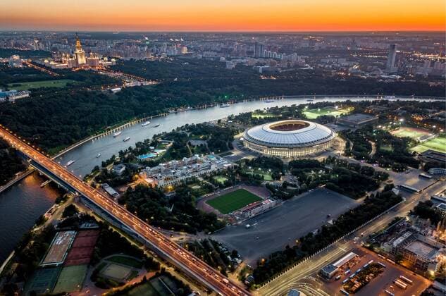 MOSCOW, RUSSIA - AUGUST 15, 2017: An aerial view of Luzhniki Stadium (C), Lushniki Sports Complex and the main building of Lomonosov Moscow State University (back) at night. Dmitry Serebryakov TASS  79814662st