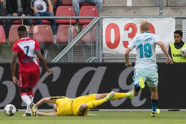 (L-R) Gyrano Kerk of FC Utrecht, goalkeeper Andrei Lunev of FK Zenit St Petersburg, Igor Smolnikov of FK Zenit St Petersburg during the UEFA Europa League fourth round qualifying first leg match between FC Utrecht and FK Zenit St Petersburg at the Nieuw Galgenwaard Stadium on August 16, 2017 in Utrecht, The Netherlands FC Utrecht v FK Zenit St Petersburg UEFA Europa League 2017 2018 xVIxVIxImagesx xGerritxvanxKeulenxIVx 8488415