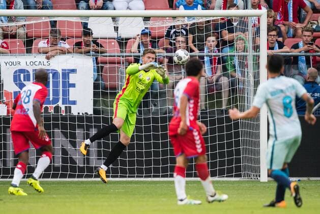 goalkeeper David Jensen of FC Utrecht saves during the UEFA Europa League fourth round qualifying first leg match between FC Utrecht and FK Zenit St Petersburg at the Nieuw Galgenwaard Stadium on August 16, 2017 in Utrecht, The Netherlands FC Utrecht v FK Zenit St Petersburg UEFA Europa League 2017 2018 xVIxVIxImagesx xGerritxvanxKeulenxIVx 8488760