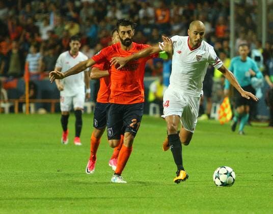 Mahmut Tekdemir of Basaksehir and Guido Pizarro of Sevilla during the UEFA Champions League Play Off first leg football match Medipol Basaksehir vs FC Sevilla, on August 16 2017 at the Basaksehir Fatih Terim Stadium in Istanbul , Turkey. 