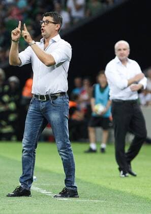 KRASNODAR, RUSSIA - AUGUST 17, 2017: Crvena Zvezda Belgrade s head coach Vladan Milojevic (front), FC Krasnodarâ€™s head coach Igor Shalimov (back) in the 2017 2018 UEFA Europa League Playoff 1st Leg football match at Krasnodar Stadium. Vitaly Timkiv TASS  TS05BC44