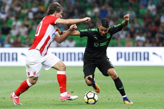 KRASNODAR, RUSSIA - AUGUST 17, 2017: Crvena Zvezda Belgrade s Filip Stojkovic (L) and FC Krasnodarâ€™s Wanderson fight for the ball in their 2017 2018 UEFA Europa League Playoff 1st Leg football match at Krasnodar Stadium. Vitaly Timkiv TASS  TS05BC4D