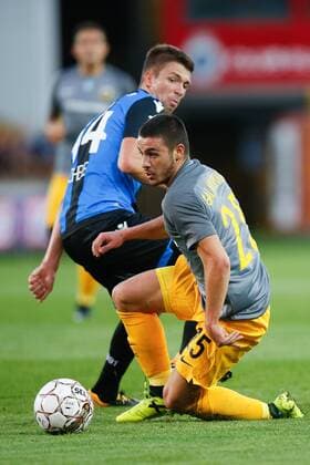 Club s Brandon Mechele and AEK s Konstantinos Galanopoulos fight for the ball during a soccer game between Belgian team Club Brugge KSV and Greek club AEK Athens F.C., the first leg of the first playoff round for the UEFA Europa League competition, Thursday 17 August 2017 in Brugge. BRUNOxFAHY  x05149123x