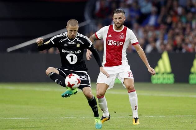 AMSTERDAM, Stadion Arena , 17-08-2017 . Voorronde Europa League seizoen 2017 2018 . Ajax - Rosenborg BK . Mitchell Djks in duel met Rosenborg-speler Milan Jevtovic Ajax - Rosenborg  x1673453x