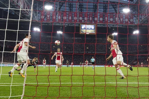 AMSTERDAM , Ajax - Rosenborg BK , 17-08-2017 , Stadion Arena , play-offs UEFA Europa League , Ajax speler Joel Veltman haalt de kopbal van Rosenborg BK speler Nicklas Bendtner van de lijn . Ajax - Rosenborg  x1673495x