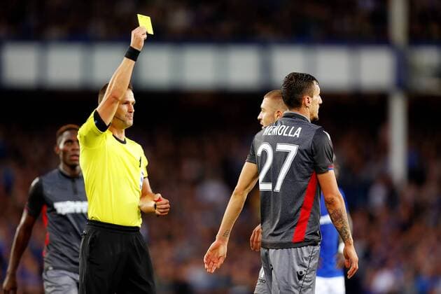 August 17th 2017, Goodison Park, Liverpool, England; UEFA Europa League Playoff, first leg; Everton versus Hajduk Split; Hysen Memolla of Hajuk Split is cautioned and shown the yellow card by Referee Ivan Kruzliak (SVK) xPaulxKeevilx  ActionPlus11917608
