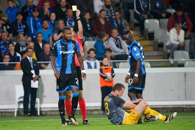Club s Stefano Denswil receives a yellow card from the referee during a soccer game between Belgian team Club Brugge KSV and Greek club AEK Athens F.C., the first leg of the first playoff round for the UEFA Europa League competition, Thursday 17 August 2017 in Brugge. KURTxDESPLENTER  x05149231x