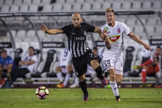 August 17th 2017, Partizan Stadium, Belgrade, Serbia; UEFA Europa League Playoff, first leg; Partizan versus Videoton; Nemanja Miletic of Partizan fights for the ball against Geresi Kristin of Videoton xNikolaxKrsticx  ActionPlus11917659
