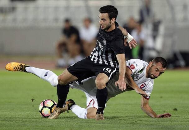 (170818) -- BELGRADE, Aug. 18, 2017 -- Partizan s Marko Jankovic (L) vies with Videoton s Attila Fiola during the UEFA Europa League play-offs first leg football match between Partizan and Videoton in Belgrade, Serbia, on Aug, 17. 2017. The match ended 0-0 tie. ) (SP)SERBIA-BELGRADE-SOCCER-UEFA-PARTIZAN VS VIDEOTON PredragxMilosavljevic 