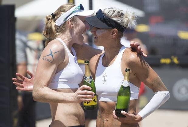 August 20, 2017 - Manhattan Beach, California, U.S - Sunday, 19 Aug 2017. Emily Day and Joy Hochevar won the 2017 AVP Manhattan Beach Open in Manhattan Beach California. Day Hochevar topped No. 15 seed Nicole Branagh and Brandie Wilkerson 21-18, 21-18 in the championship match. Pictured are Emily Day and Joy Hochevar celebrating with champagne after the win. Day Hochevar wins 2017 AVP Manhattan Beach Open - ZUMAp124 20170820_zaa_p124_010 Copyright: xRexxAtienzax