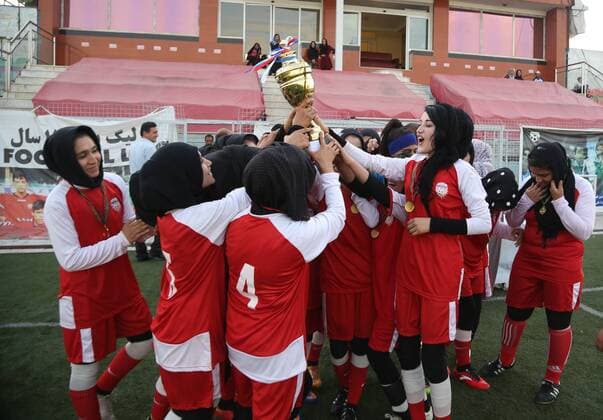 (170824) -- KABUL, Aug. 24, 2017 -- Kabul Club players celebrate with the trophy at the end of a competition in Kabul, capital of Afghanistan, Aug. 22, 2017. The 21-day women s Premier League organized by the Afghan Football Federation among eight teams, concluded in Kabul on Tuesday and the team of Kabul Club won the title. ) (SP)AFGHANISTAN-KABUL-SOCCER-WOMEN FOOTBALL-PREMIER LEAGUE RahmatxAlizadah 