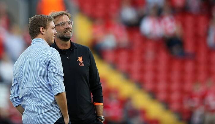 Jurgen Klopp manager of Liverpool and Julian Nagelsmann manager of 1899 Hoffenheim during the Champions League playoff round at the Anfield Stadium, Liverpool. Picture date 23rd August 2017. Picture credit should read: Lynne Cameron Sportimage EDITORIAL USE ONLY. No use with unauthorised audio, video, data, fixture lists, club league logos or live services. Online in-match use limited to 120 images, no video emulation. No use in betting, games or single club league player publications.