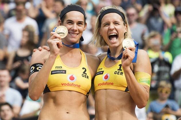 HAMBURG, GERMANY - AUGUST 26: Kira Walkenhorst and Laura Ludwig of Germany celebrate after winning the gold medal match during Day 4 of the Swatch Beach volleyball Beachvolleyball FIVB World Tour Finals Hamburg 2017 on August 26, 2017 in Hamburg, Germany. (Photo by Malte Christians Hoch Zwei) Hamburg Germany xHOCHxZWEIx