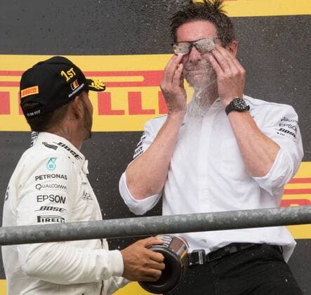 Mercedes British driver Lewis Hamilton and Mercedes AMG Managing Director Andy Cowell celebrate on the podium after winning the Spa-Francorchamps Formula One Grand Prix of Belgium race, in Spa-Francorchamps, Sunday 27 August 2017. BENOITxDOPPAGNE  x05153344x
