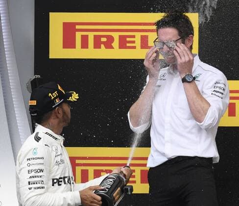 Mercedes British driver Lewis Hamilton and Andy Cowell Managing director of Mercedes AMG celebrate on the podium after the Spa-Francorchamps Formula One Grand Prix of Belgium race, in Spa-Francorchamps, Sunday 27 August 2017. NICOLASxLAMBERT  x05153454x