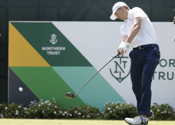 Jordan Spieth hits his tee shot on the first hole in the final round of The Northern Trust golf championship at the Glen Oaks Club in Old Westbury, New York on August 27, 2017. Glen Oaks Club is hosting THE NORTHERN TRUST for the first time.  NYP20170827104 JOHNxANGELILLO