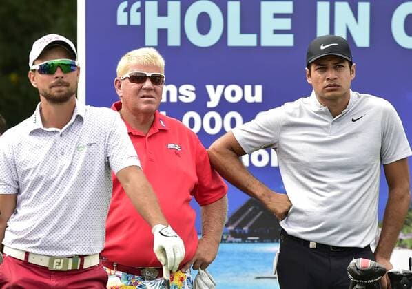 Czech golf player Filip Mruzek, from left, John Daly and Julian Suri of USA pose during the Czech Masters European Tour tournament in Vysoky Ujezd near Prague, Czech Republic, August 31, 2017. (CTKxPhoto RomanxVondrous) CTKPhotoP201708310890101  vnd 9