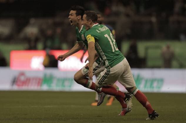 September 1, 2017 - EUM20170901DEP20.JPG.CIUDAD DE MEXICO Soccer Futbol-Seleccion Mexicana Concacaf.- Hirving Lozano al fondo- festeja su gol ante Panama, partido correspondiente a las eliminatorias de Concacaf rumbo a Rusia 2017, el viernes 1 de septiembre de 2017 en el Estadio Azteca. Tras 90 minutos, Mexico derroto 1-0 a Panama y consiguio la clasificacion al Mundial. En la imagen acompana el capitan Andres Guardado. Foto: Agencia EL UNIVERSAL Luis Cortes EVZ Latin News: September 1, 2017  - ZUMAu78_ 20170901_zaf_u78_109 Copyright: xAlejandroxAcostax