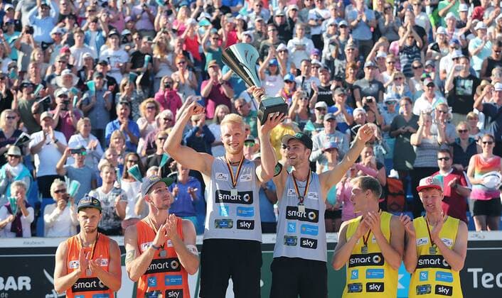 Deutscher Beachvolleyball Meister, Tim Holler-Clemens Wickler, 2. Platz Sebastian Fuchs-Eric Stadie, 3.Platz Philipp Arne Bergmann-Yannick Harms, Siegerehrung