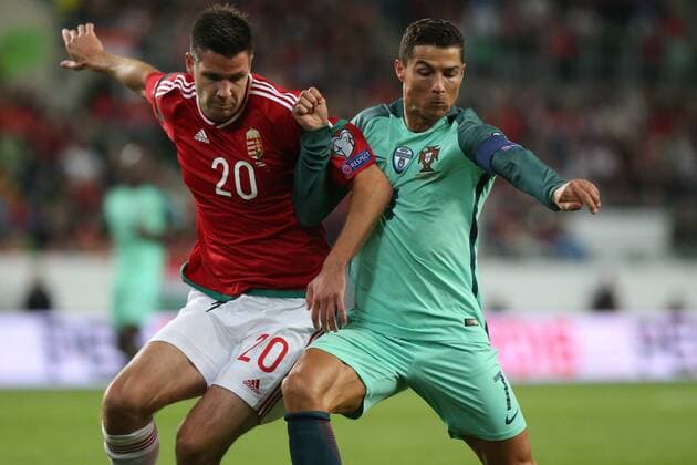 SOCCER - FIFA World Cup WM Weltmeisterschaft Fussball 2018 quali BUDAPEST,HUNGARY,03.SEP.17 - SOCCER - FIFA World Cup 2018, european qualifiers, Hungary vs Portugal. Image shows Richard Guzmics (HUN) and Cristiano Ronaldo (POR). GEPAxpictures xCsabaxDoemoetoer