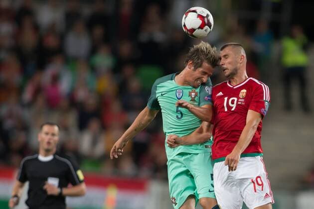(170904) -- BUDAPEST, Sept. 4, 2017 -- Fabio Coentrao (L) of Portugal and Tamas Priskin (R) of Hungary go for a header during the 2018 FIFA World Cup WM Weltmeisterschaft Fussball qualification match between Portugal and Hungary in Budapest, Hungary on Sept. 3, 2017. Portugal defeat Hungary 1-0. ) (SP)HUNGARY-BUDAPEST-FIFA WORLD CUP QUALIFICATION-PORTUGAL VS HUNGARY AttilaxVolgyi 
