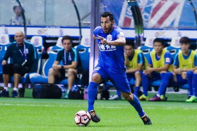 Carlos Tevez of Shanghai Greenland Shenhua F.C. dribbles during the 18th round match between Shanghai Greenland Shenhua F.C. and Beijing Guoan F.C. of the 2017 Chinese Football Association Super League in Shanghai, China, 23 July 2017. Carlos Tevez  20170723_32750