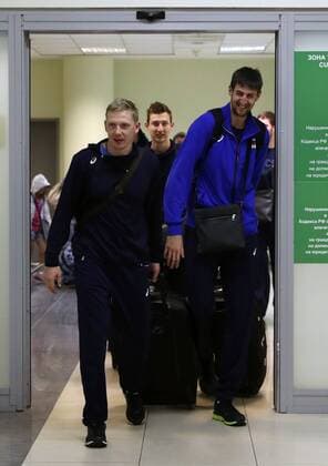 MOSCOW REGION, RUSSIA - SEPTEMBER 4, 2017: Sergey Grankin, Artem Volvich (L-R front) and Dmitry Volkov (C background), members of the Russian men s national volleyball team, welcomed at Sheremetyevo International Airport. Team Russia has won the 2017 Men s European Volleyball Championship in Poland. Vycheslav Prokofyev TASS  TS05E44D