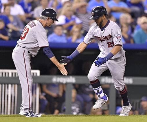 September 8, 2017 - Kansas City, MO, USA - The Minnesota Twins Eddie Rosario is congratulated by third base coach Gene Glynn, left, after Rosario hit a solo home run in the third inning against the Kansas City Royals at Kauffman Stadium in Kansas City, Mo., on Friday, Sept. 8, 2017. Minnesota at Kansas City - ZUMAm67_ 20170908_zaf_m67_062 Copyright: xJohnxSleezerx