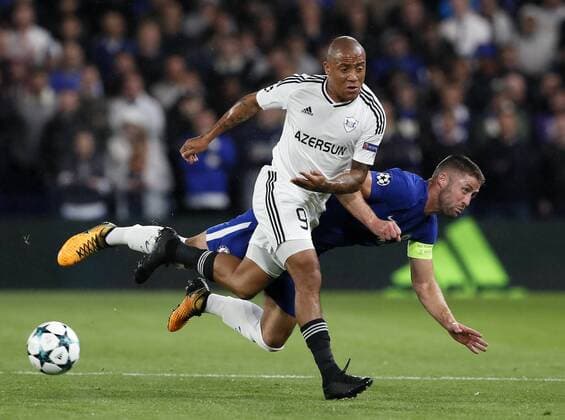Chelsea s Gary Cahill tussles with Qarabag s Dino Ndlovu during the champions league match at Stamford Bridge Stadium, London. Picture date 12th September 2017. Picture credit should read: David Klein Sportimage EDITORIAL USE ONLY. No use with unauthorised audio, video, data, fixture lists, club league logos or live services. Online in-match use limited to 120 images, no video emulation. No use in betting, games or single club league player publications.