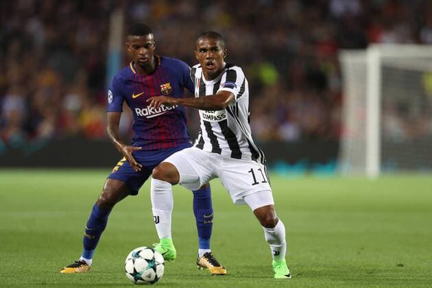 September 12, 2017 - Barcelona, Spain - Douglas Costa of Juventus controls the ball under pressure from Nelson Semedo of FC Barcelona Barca during the UEFA Champions League, Group D football match between FC Barcelona and Juventus FC on September 12, 2017 at Camp Nou stadium in Barcelona, Spain. Football - UEFA Champions League - FC Barcelona vs Juventus FC  - ZUMAb169 20170912_zaa_b169_008 Copyright: xManuelxBlondeau Aop.Pressx