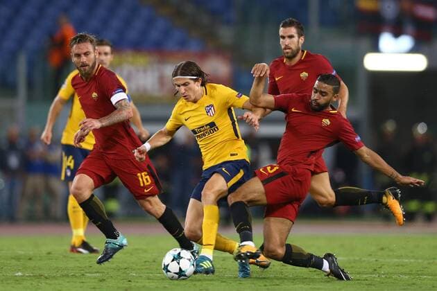 September 12, 2017 - Rome, Italy - Uefa Champions League: Group C Roma v Atletico de Madrid .Groggier Defrel of Roma tackling on Filipe Luis of Atletico at Olimpico Stadium in Rome, Italy on September 12, 2017. AS Roma v Atletico Madrid - UEFA Champions League  - ZUMAn230 20170912_zaa_n230_485 Copyright: xMatteoxCiambellix