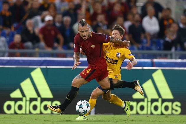 September 12, 2017 - Rome, Italy - Uefa Champions League: Group C Roma v Atletico de Madrid .Radja Nainggolan of Roma and Luciano Vietto of Atletico at Olimpico Stadium in Rome, Italy on September 12, 2017. AS Roma v Atletico Madrid - UEFA Champions League  - ZUMAn230 20170912_zaa_n230_489 Copyright: xMatteoxCiambellix
