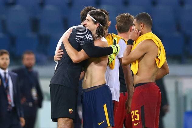 September 12, 2017 - Rome, Italy - Uefa Champions League: Group C Roma v Atletico de Madrid .Brazilians Alisson Becker of Roma, Filipe Luis of Atletico and Bruno Peres of Roma at the end of the match at Olimpico Stadium in Rome, Italy on September 12, 2017. AS Roma v Atletico Madrid - UEFA Champions League  - ZUMAn230 20170912_zaa_n230_491 Copyright: xMatteoxCiambellix