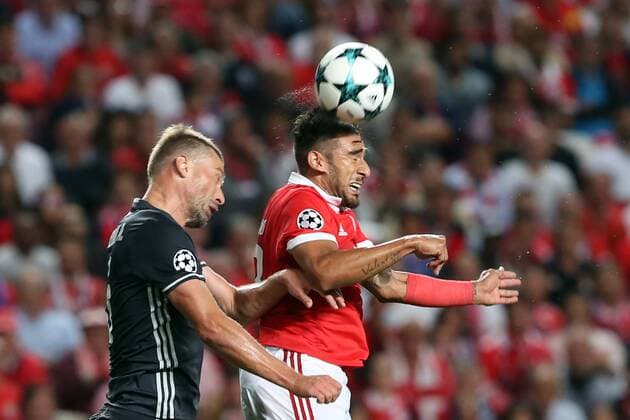 September 12, 2017 - Lisbon, Portugal - Benfica s Argentine midfielder Eduardo Salvio heads the ball with CSKA s defender Georgi Schennikov during UEFA Champions League football match SL Benfica vs CSKA Moscow at the Luz stadium in Lisbon, Portugal on September 12, 2017. Photo: UEFA Soccer 2017: Benfica vs CSKA Moscow - ZUMAf123 20170912_zap_f123_016 Copyright: xPedroxFiuzax