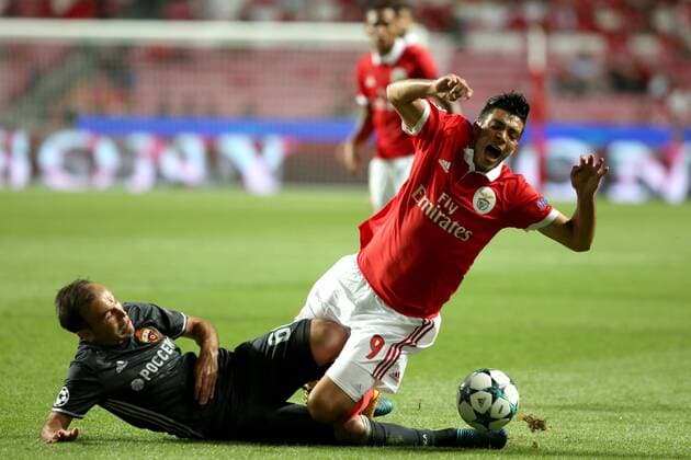 September 12, 2017 - Lisbon, Portugal - Benfica s Mexican forward Raul Jimenez fights for the ball with CSKA s defender Aleksei Berezutski (L) during UEFA Champions League football match SL Benfica vs CSKA Moscow at the Luz stadium in Lisbon, Portugal on September 12, 2017. Photo: UEFA Soccer 2017: Benfica vs CSKA Moscow - ZUMAf123 20170912_zap_f123_050 Copyright: xPedroxFiuzax