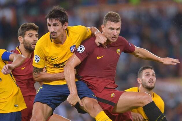 Edin Dzeko Roma, Stefan Sadic Atletico. Roma 12-09-2017 Stadio Olimpico Champions League, Fase a gironi. AS Roma - Atletico Madrid Foto Antonietta Baldassarre Insidefoto AntoxBaldassarre