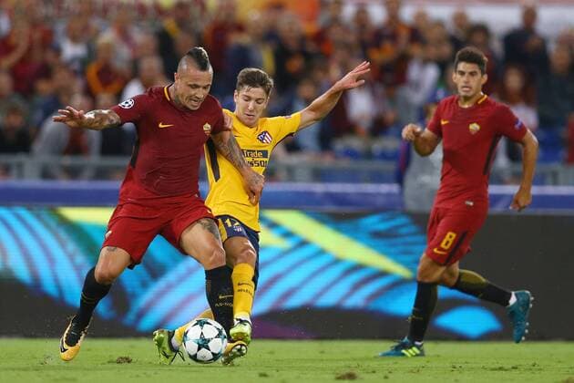 September 12, 2017 - Rome, Italy - Radja Nainggolan of Roma and Luciano Vietto of Atletico during the UEFA Champions League Group C football match between AS Roma and Atletico Madrid on September 12, 2017 at the Olympic stadium in Rome. AS Roma v Atletico Madrid - UEFA Champions League  - ZUMAn230 20170912_zaa_n230_763 Copyright: xMatteoxCiambellix