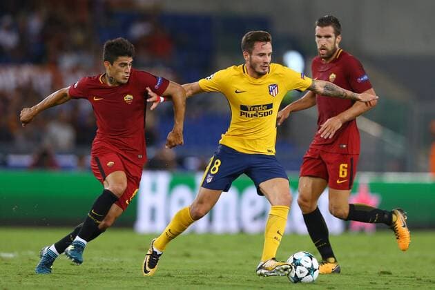 September 12, 2017 - Rome, Italy - Saul Niguez of Atletico between Diego Perotti of Roma and Kevin Strootman of Roma during the UEFA Champions League Group C football match between AS Roma and Atletico Madrid on September 12, 2017 at the Olympic stadium in Rome. AS Roma v Atletico Madrid - UEFA Champions League  - ZUMAn230 20170912_zaa_n230_773 Copyright: xMatteoxCiambellix
