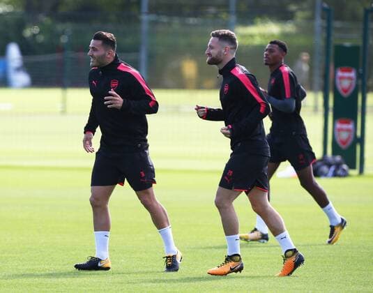 September 13, 2017 - London, England, United Kingdom - L-R Arsenal s Sead Kolasinac and Arsenal s Shkodran Mustafi.during a Arsenal training session ahead of the UEFA Europa League Group H match against 1. FC Kln at Arsenal training centre , London Colney on 13 Sep 2017 St.Albans, England Arsenal Training  - ZUMAn230 20170913_zaa_n230_026 Copyright: xKieranxGalvinx