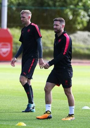 September 13, 2017 - London, England, United Kingdom - L-R Arsenal s Per Mertesacker and Arsenal s Shkodran Mustafi.during a Arsenal training session ahead of the UEFA Europa League Group H match against 1. FC Kln at Arsenal training centre , London Colney on 13 Sep 2017 St.Albans, England Arsenal Training  - ZUMAn230 20170913_zaa_n230_029 Copyright: xKieranxGalvinx