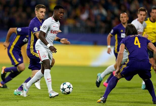 SOCCER - CL, Maribor vs Spartak MARIBOR,SLOVENIA,13.SEP.17 - UEFA Champions League, group stage, NK Maribor vs FK Spartak Moscow. Image shows Quincy Promes (Spartak) and Marko Suler (Maribor). GEPAxpictures xDavidxRodriguez