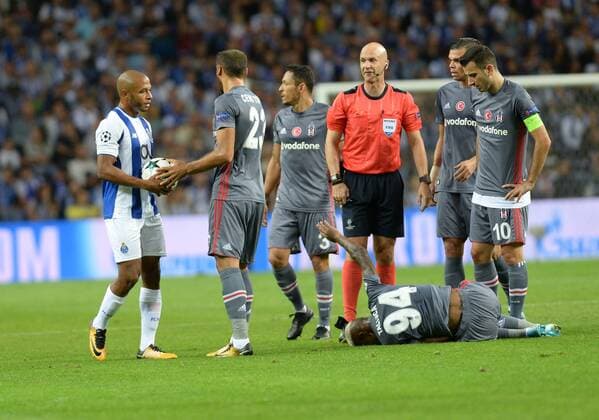 Referee Anthony Taylor and Cenk Tosun 23, Pepe , Oguzhan Ozyakup , Anderson Talisca of Besiktas during the UEFA Champions League match between Porto and Besiktas at Estadio do Dragao Stadium in Porto , Portugal on September 13 , 2017. 