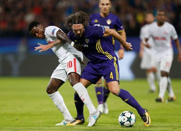 SOCCER - CL, Maribor vs Spartak MARIBOR,SLOVENIA,13.SEP.17 - UEFA Champions League, group stage, NK Maribor vs FK Spartak Moscow. Image shows Quincy Promes (Spartak) and Marko Suler (Maribor). GEPAxpictures xDavidxRodriguez